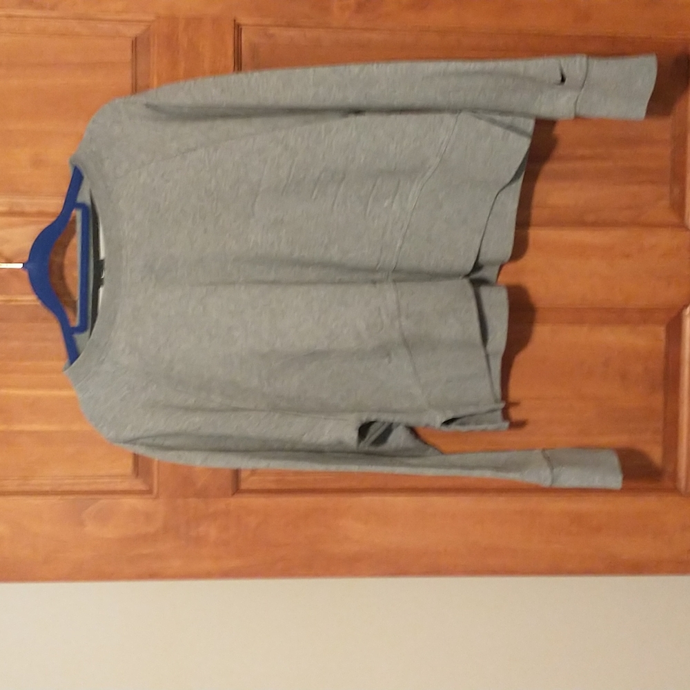 Nike women's size M  cropped sweatshirt with embossed logo and swoosh on front